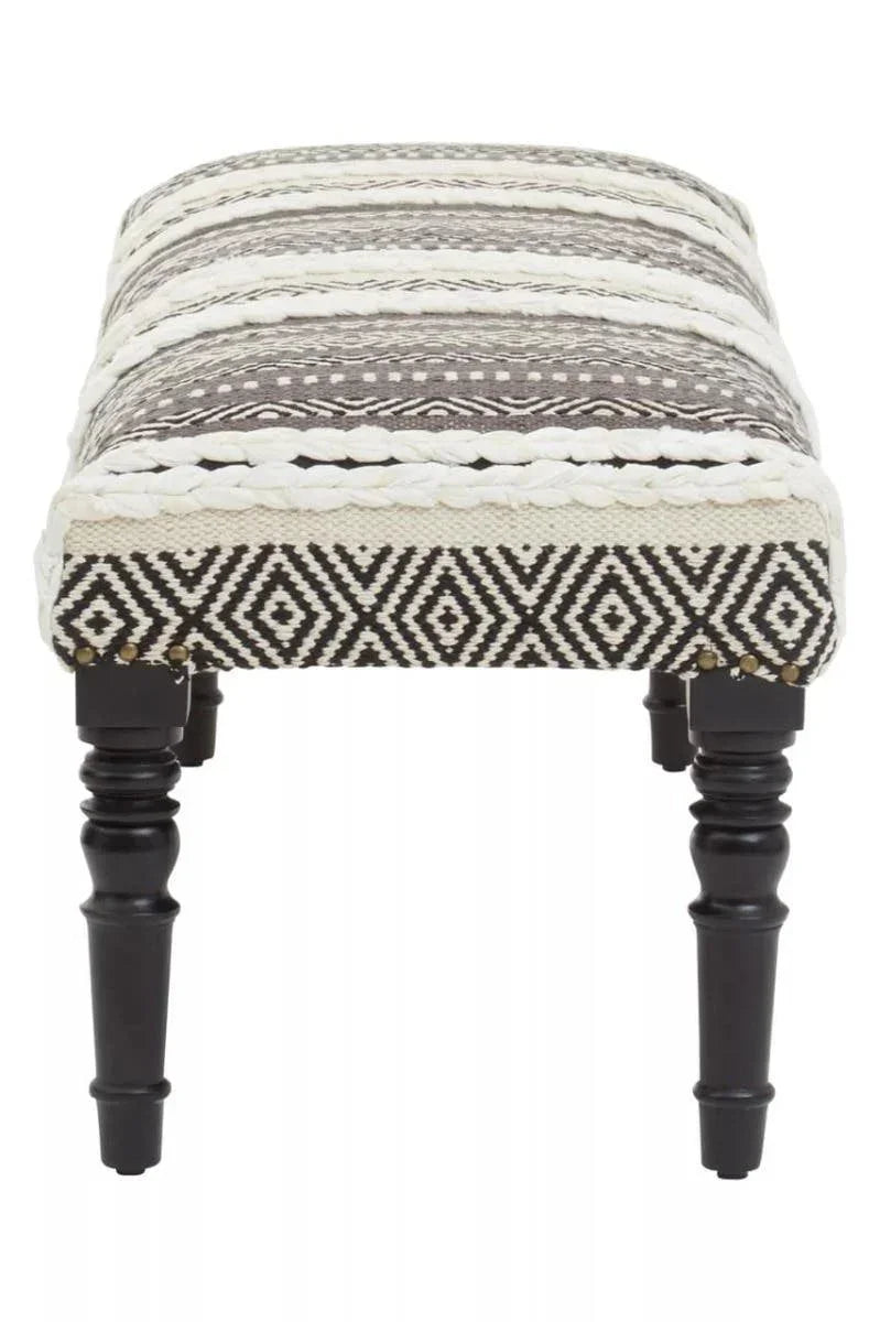 Striped fabric footstool with geometric pattern and turned black wooden legs, front view