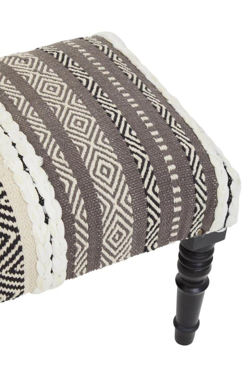 Patterned fabric footstool with black turned wood leg and geometric woven design