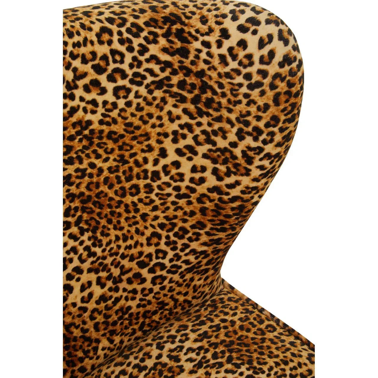 Close up of leopard print fabric on curved armchair backrest