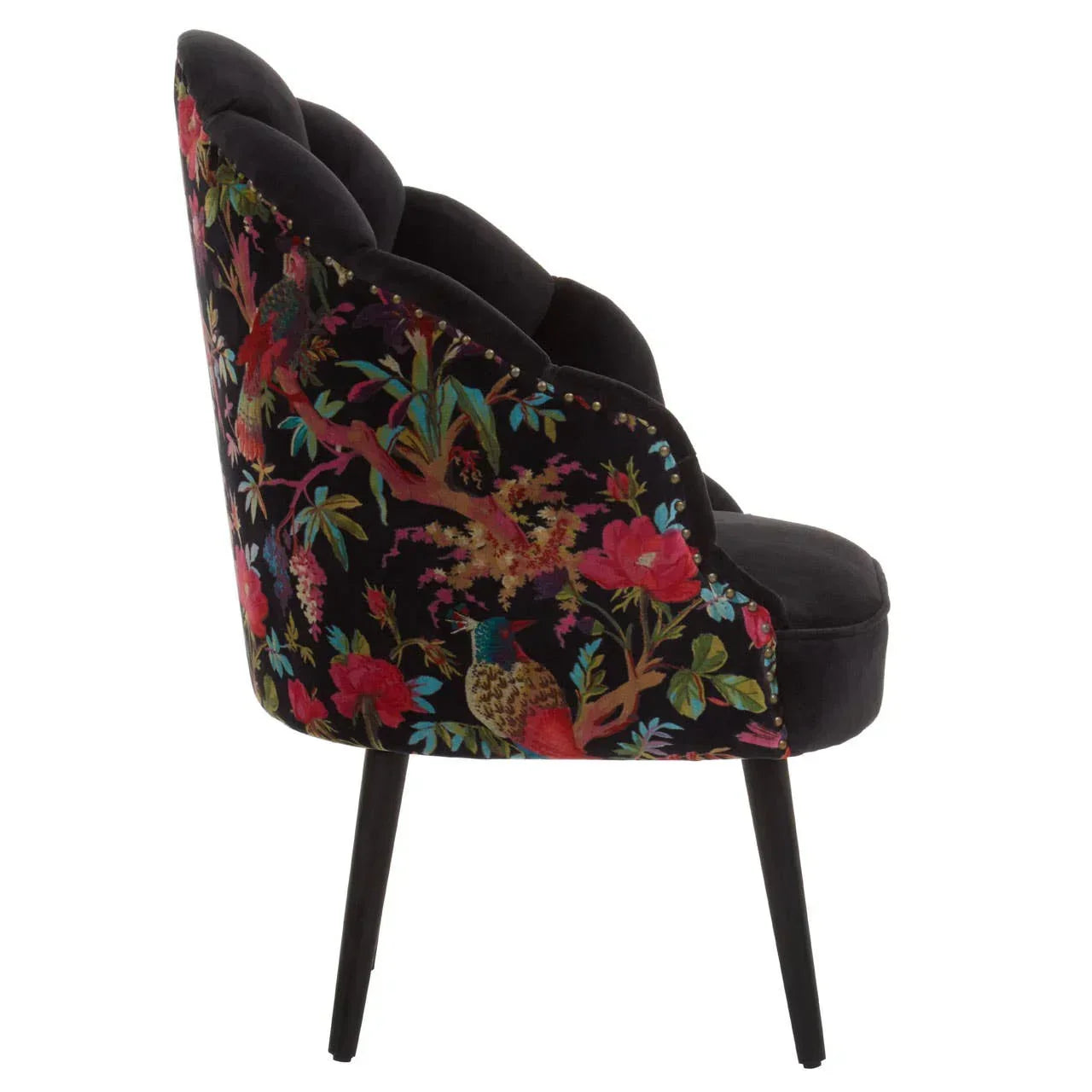 Velvet accent chair with black legs and floral peacock pattern on backrest, side view