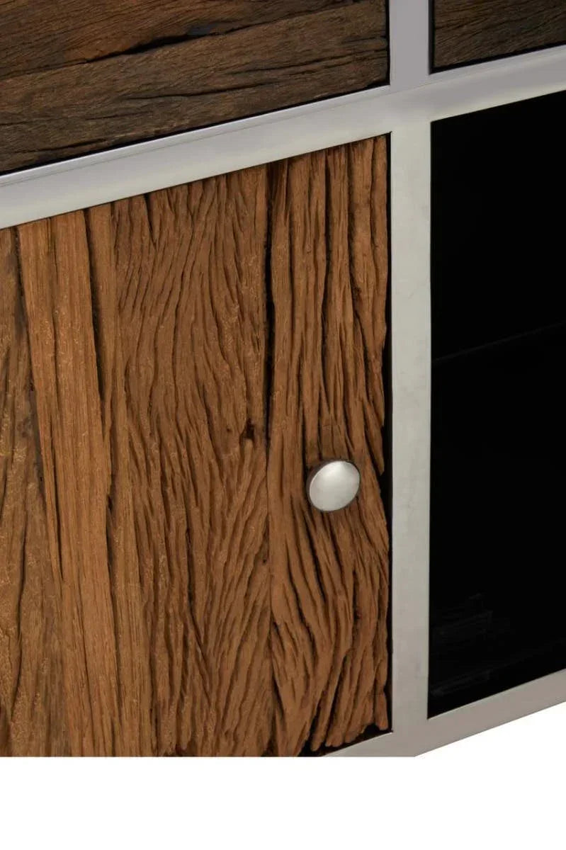Close-up of wooden cabinet door with textured grain and metal handle set in silver frame