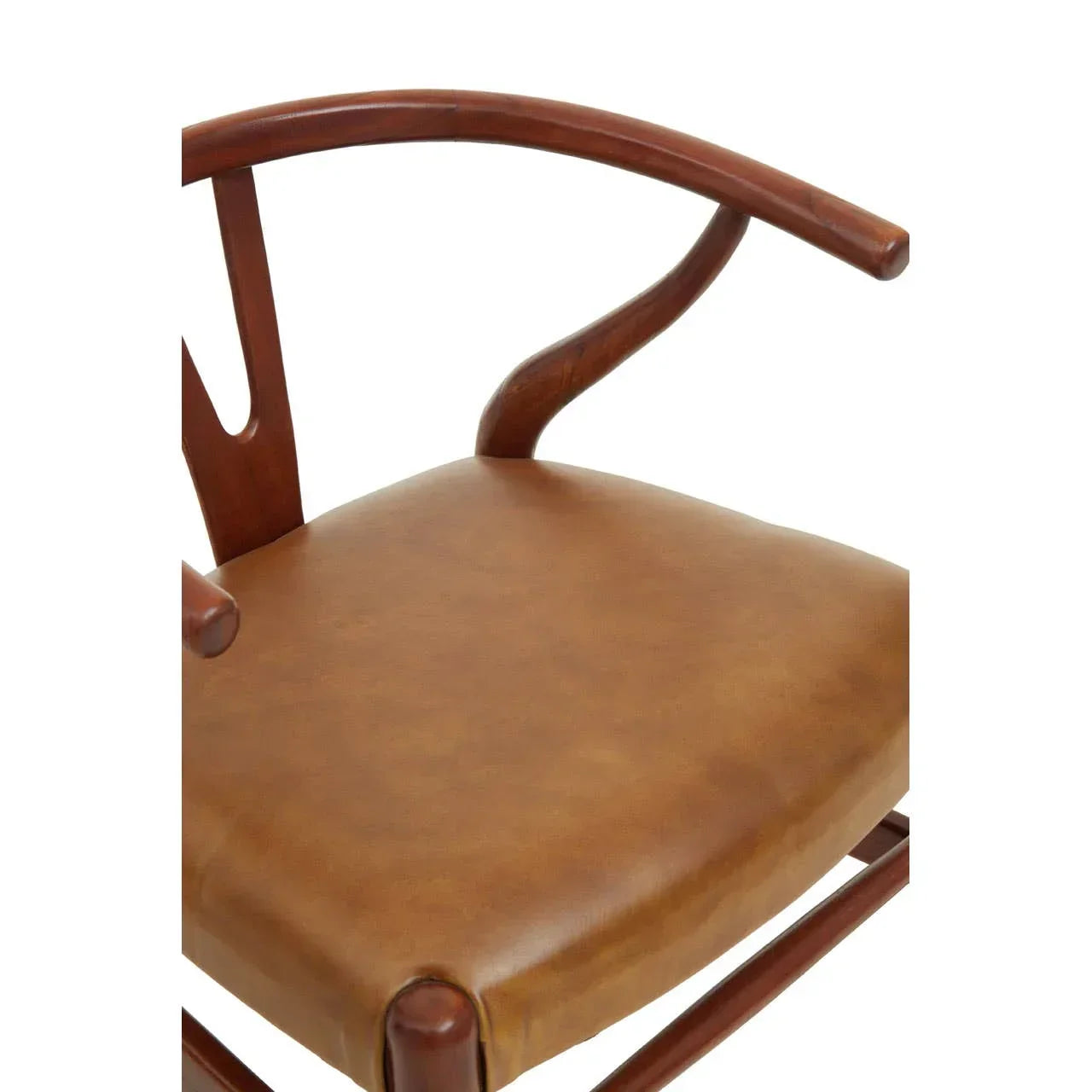 Walnut wood dining chair with curved armrest and tan leather padded seat