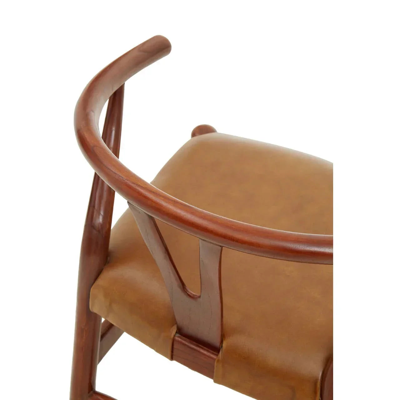 Curved wooden chair with brown leather seat close-up