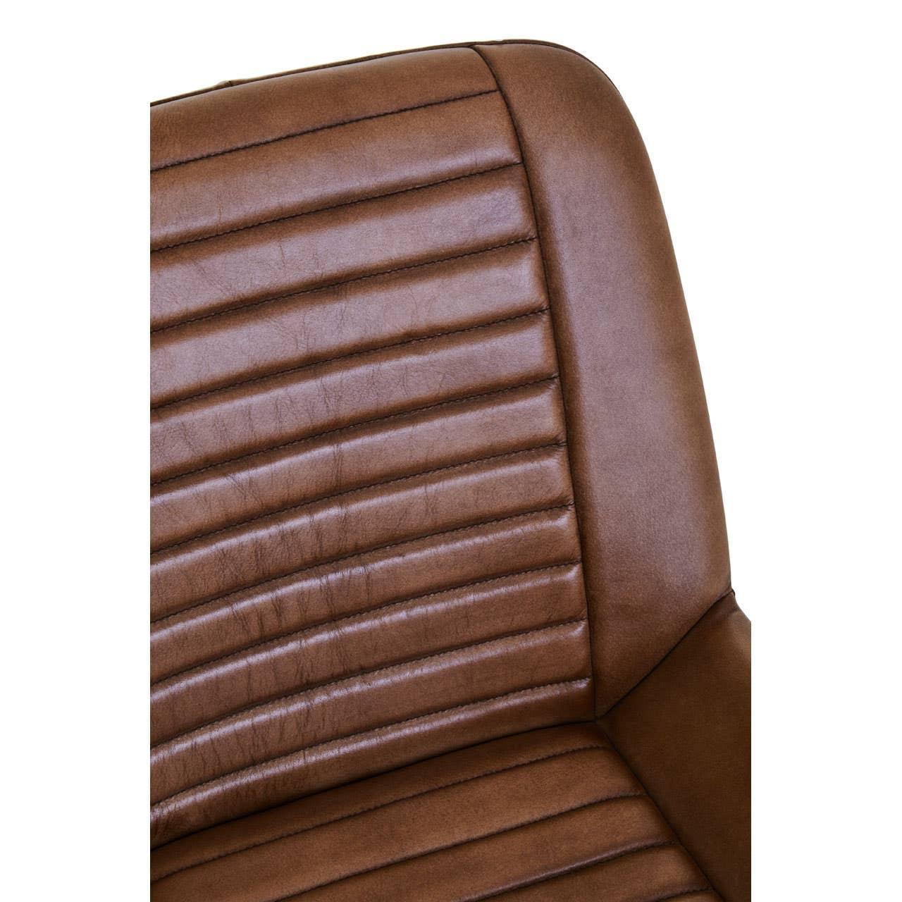 Brown leather chair backrest with horizontal stitched detailing