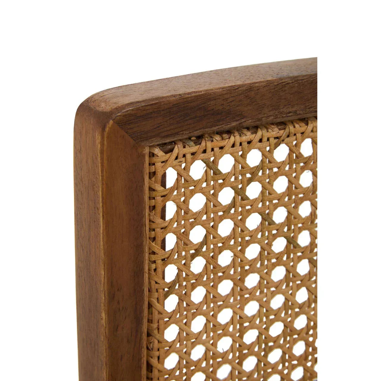 Closeup of wooden chair back with woven rattan panel and natural finish