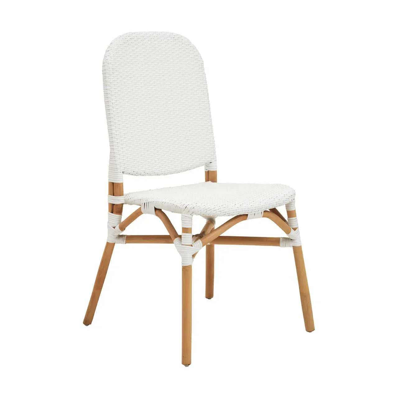 White rattan dining chair with natural wood legs and woven backrest, side view