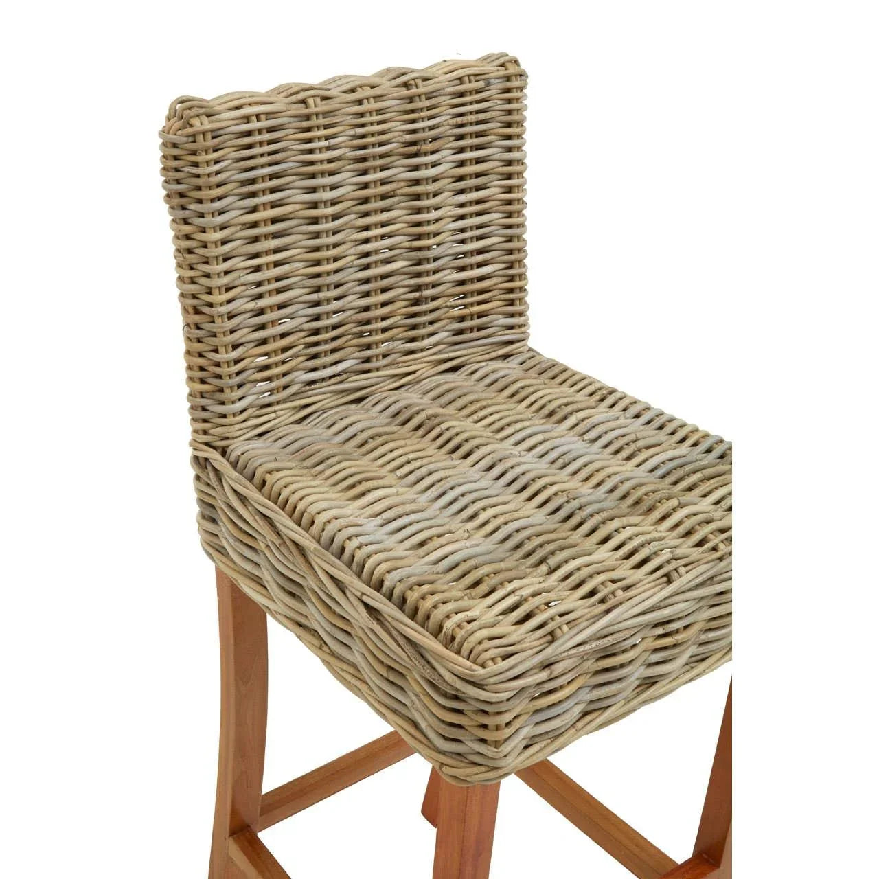 Wicker dining chair with wooden legs and woven seat, close side view