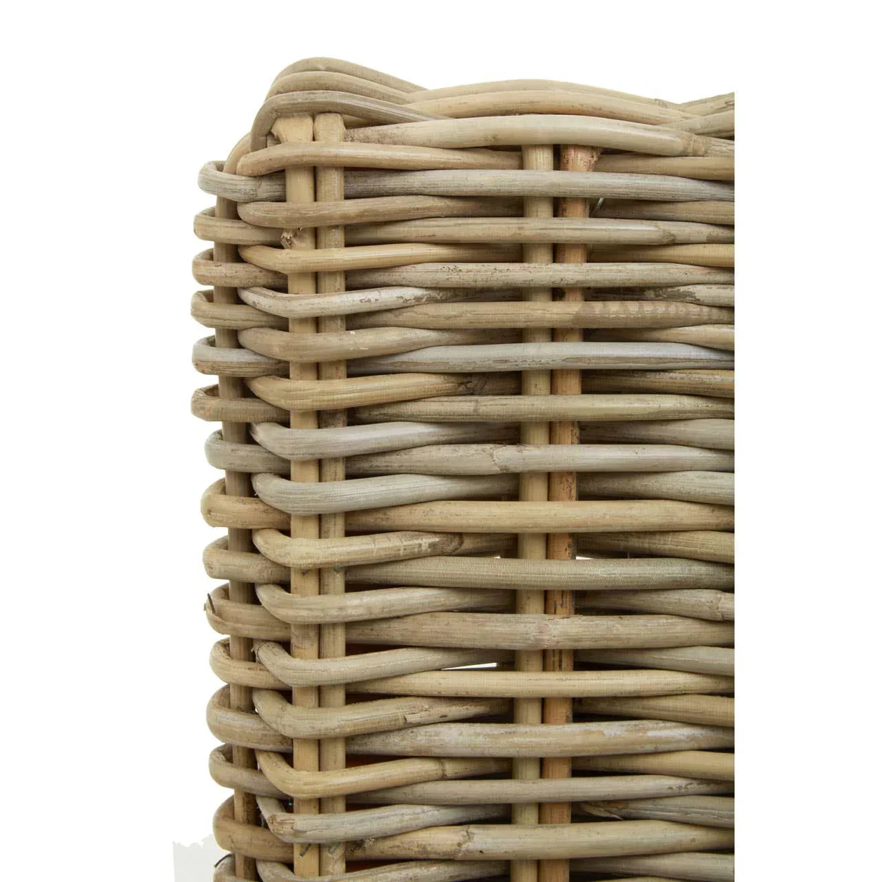 Close-up of natural rattan furniture weave showing light brown wicker texture