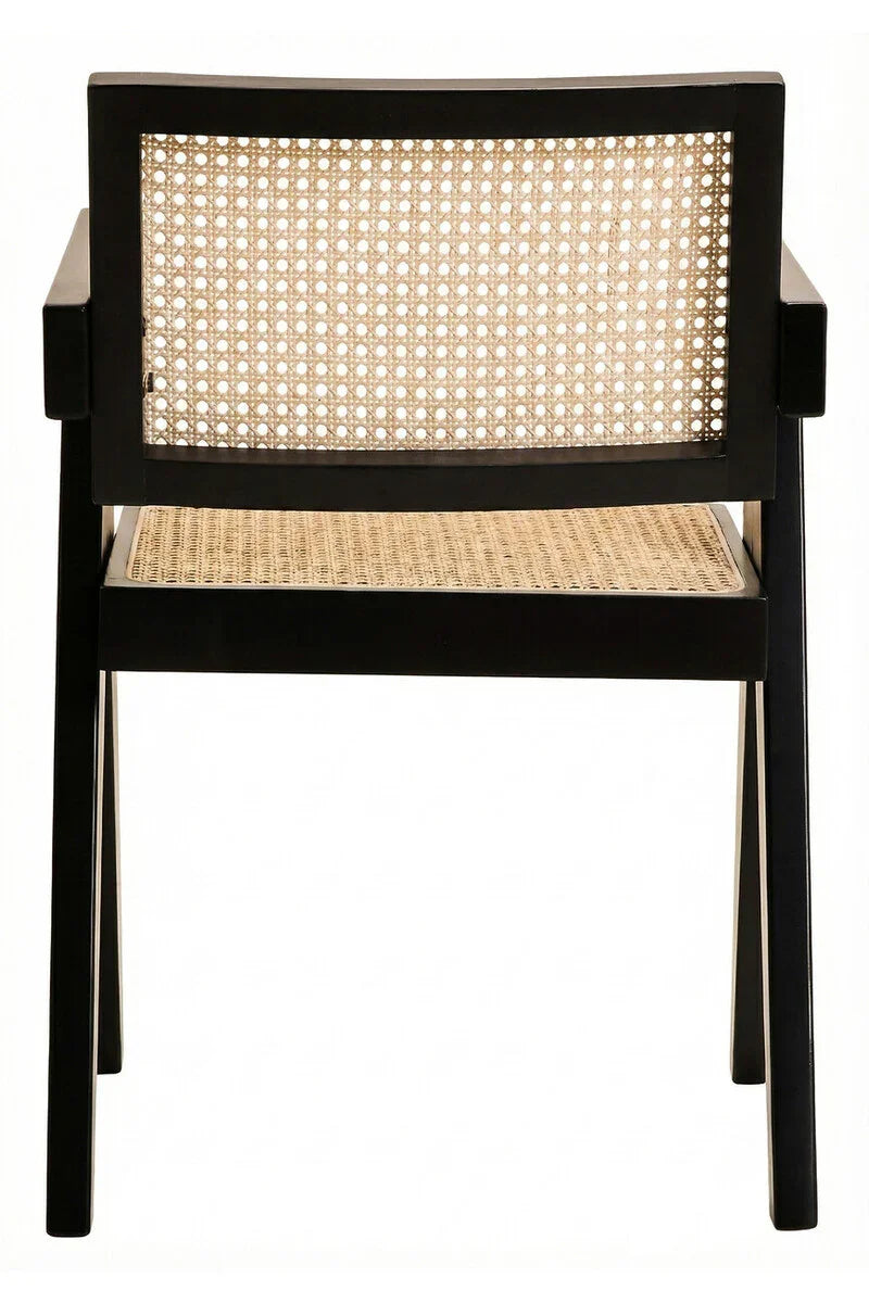 Black wooden dining chair with woven cane backrest and seat, rear view