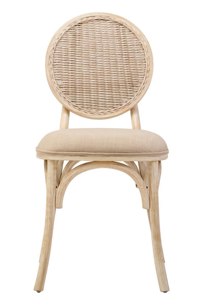 Natural rattan dining chair with round woven backrest and cushioned beige seat, front view