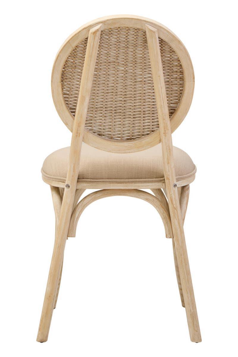 Back view of dining chair with natural rattan round backrest and cushioned seat