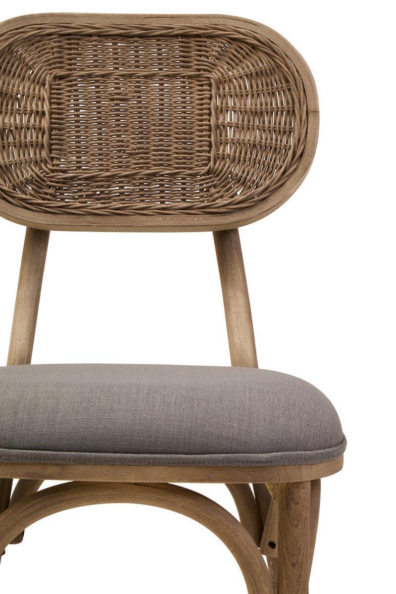 Rattan dining chair with curved wood frame and grey upholstered seat cushion, front view