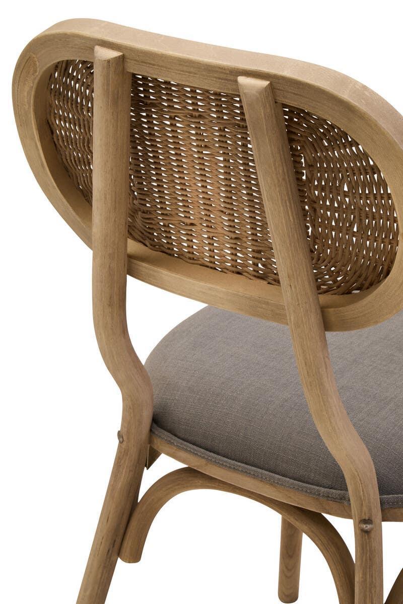 Oak dining chair with curved rattan backrest and grey upholstered seat, side angle view