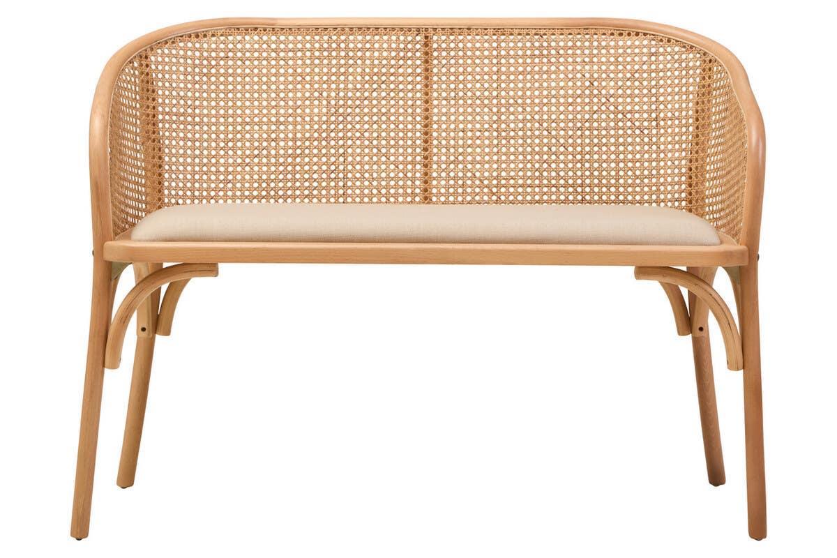 Rattan dining bench with natural wood frame and beige cushioned seat, front view
