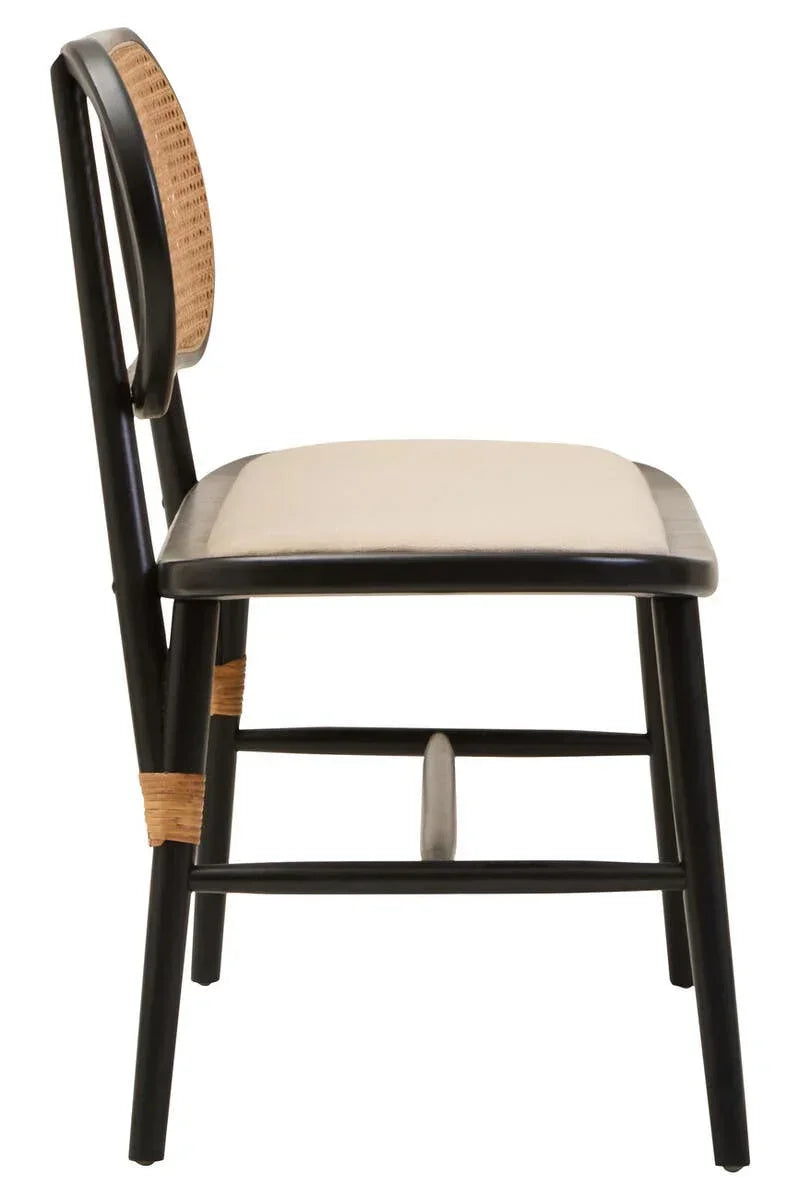 Side view black dining chair with beige cushioned seat and rattan backrest