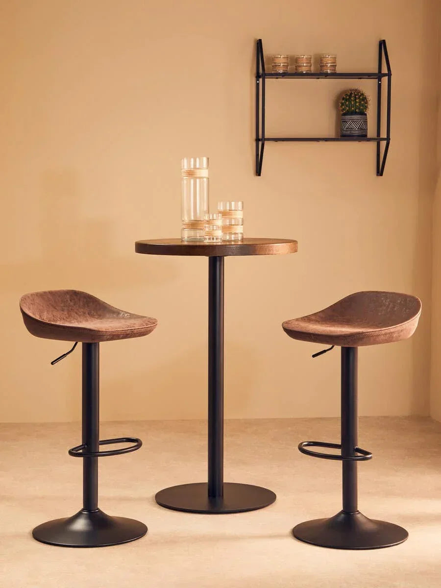 Brown bar stools with black metal bases and round bar table in modern dining set
