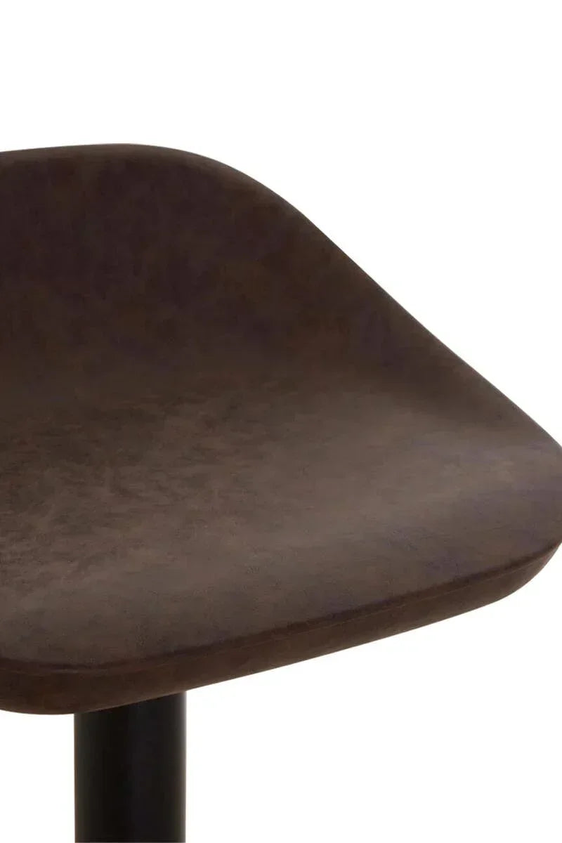 Close-up of brown faux leather dining chair seat with rounded edges