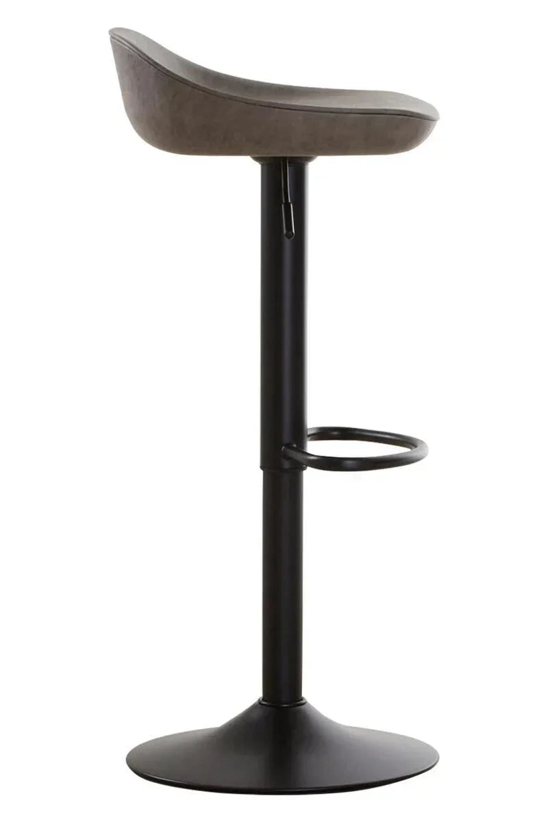 Brown faux leather bar stool with black pedestal base and built-in footrest, side view