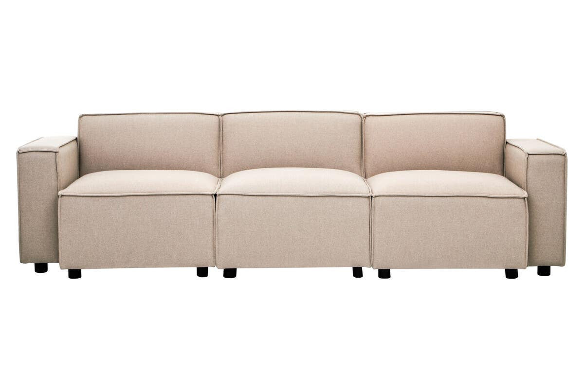 Armless modular sofa with a natural fabric upholstery in a light beige color, featuring three cushioned sections and a sleek design, supported by small black wheels for easy mobility