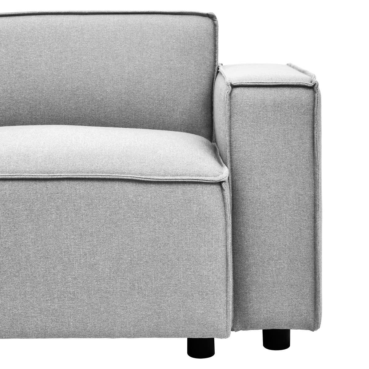Right arm section of a modular sofa upholstered in grey fabric, featuring a clean, modern design with a square armrest and subtle piping detail. The sofa rests on short, cylindrical black legs