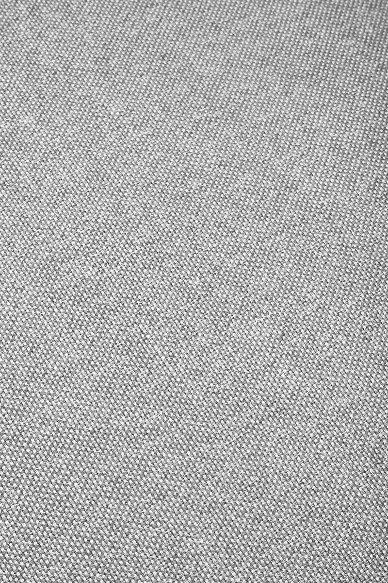 Soft grey fabric texture of a modular sofa, featuring a right arm design. The surface displays a subtle weave pattern, emphasizing the cozy and modern aesthetic