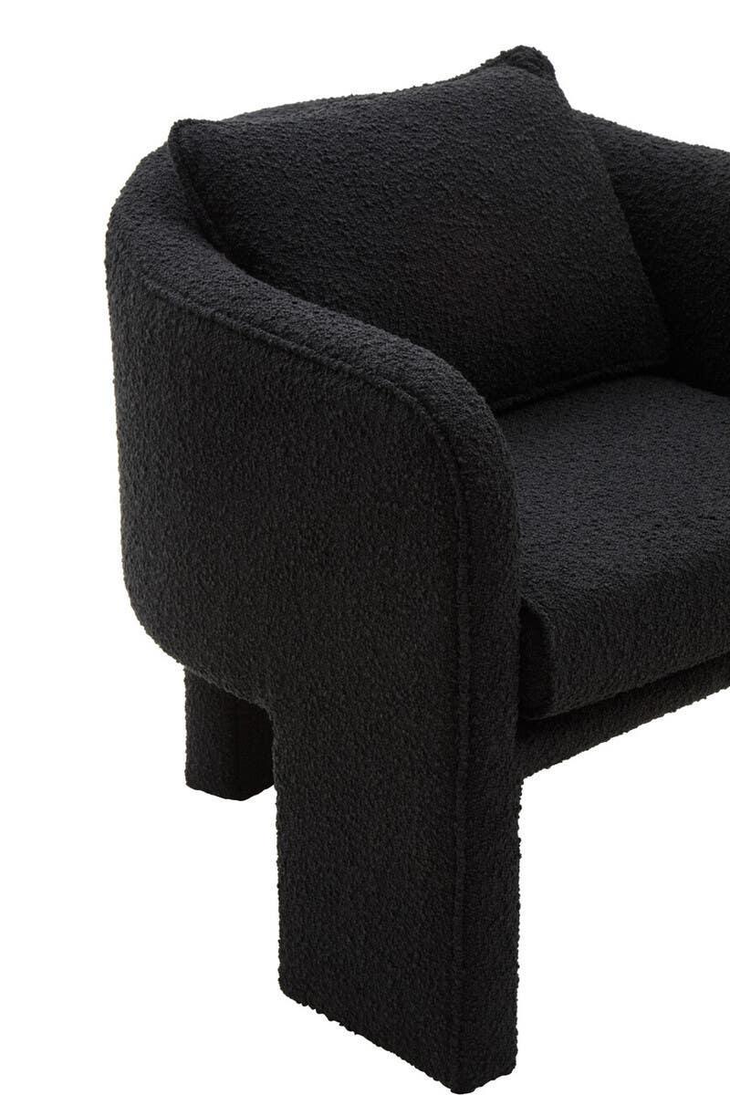 Modern black fabric armchair with curved armrest and textured upholstery