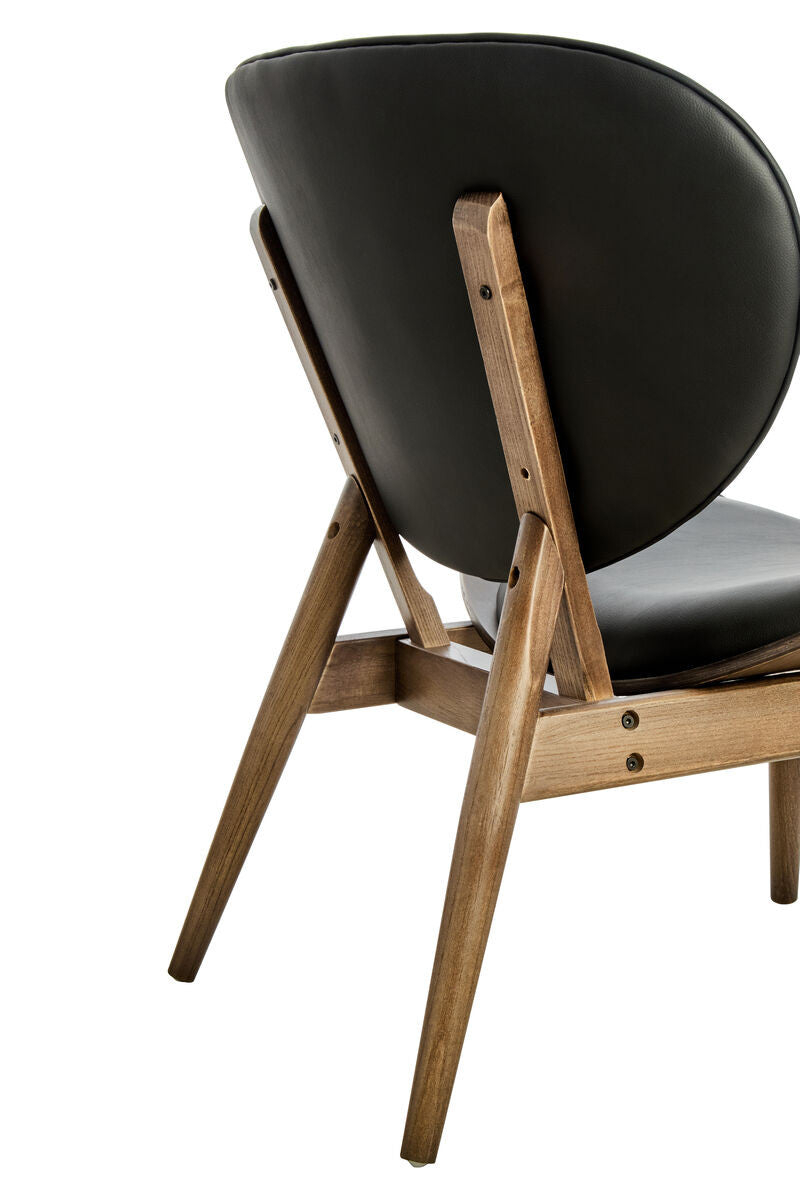 Stylish black leather effect chair featuring a curved backrest and a sturdy elm wood frame.