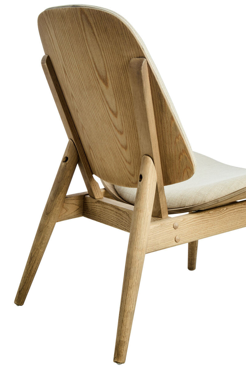 Beige fabric chair featuring a gently curved backrest and a seat cushion, supported by natural washed elm wood legs with a sleek, modern design.