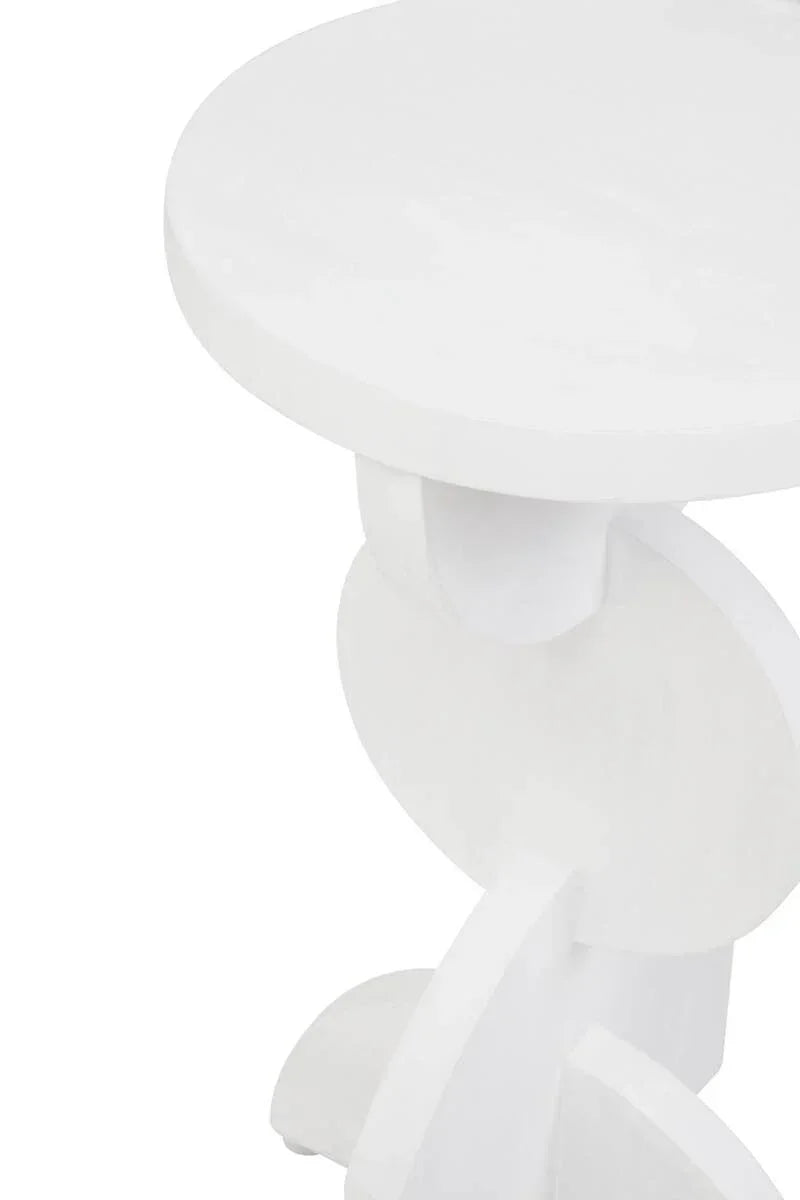 White wooden side table with circular top and geometric base, close up view