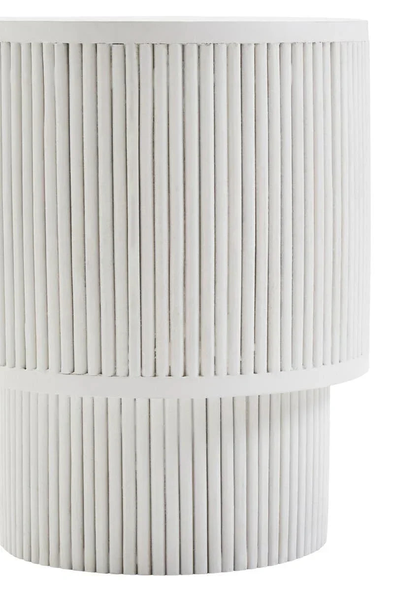 White side table with vertical fluted detailing and cylindrical shape