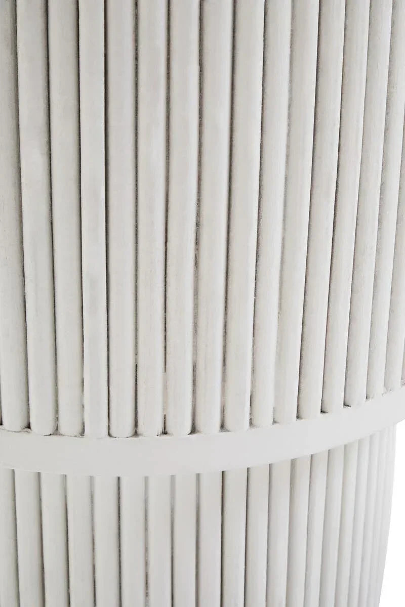 Close up of cream ribbed side table with vertical wooden slats