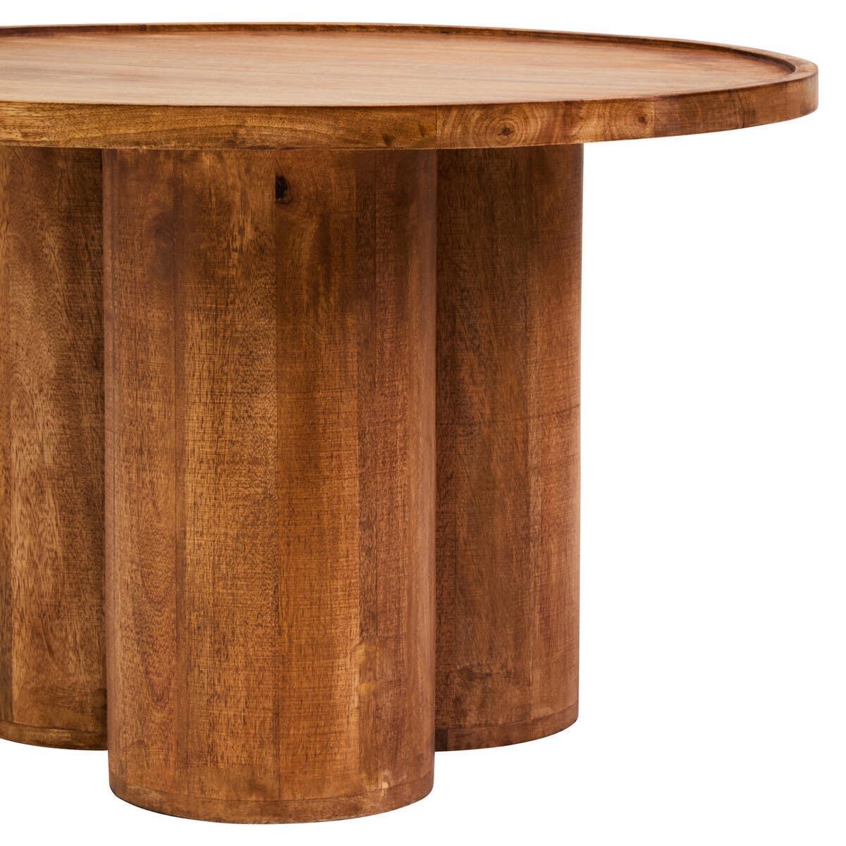 Round wooden dining table with solid cylindrical legs and natural finish