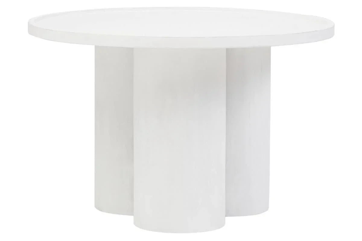 Round white dining table with three cylindrical pedestal legs