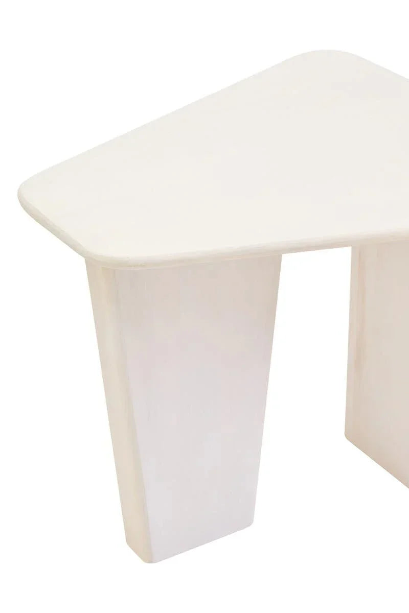 White wooden coffee table with angled legs and smooth triangular top