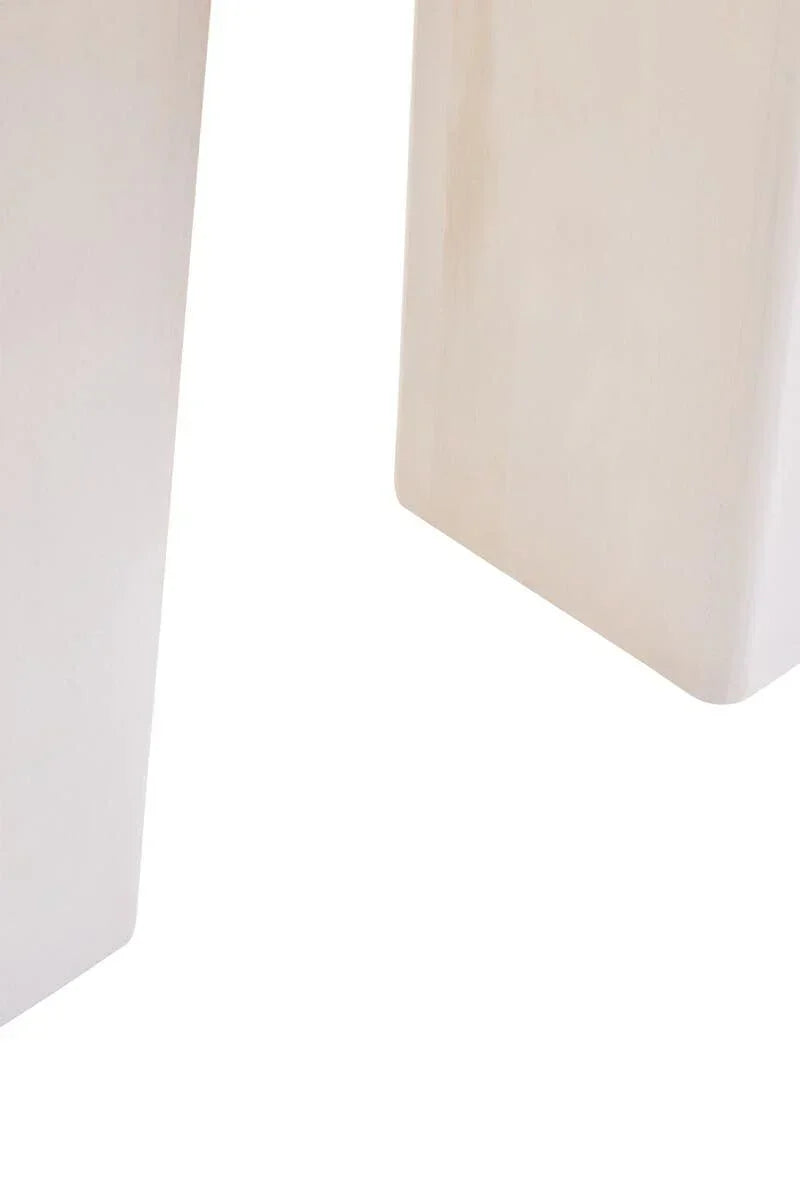 Light wood furniture legs closeup with smooth finish and rounded corners