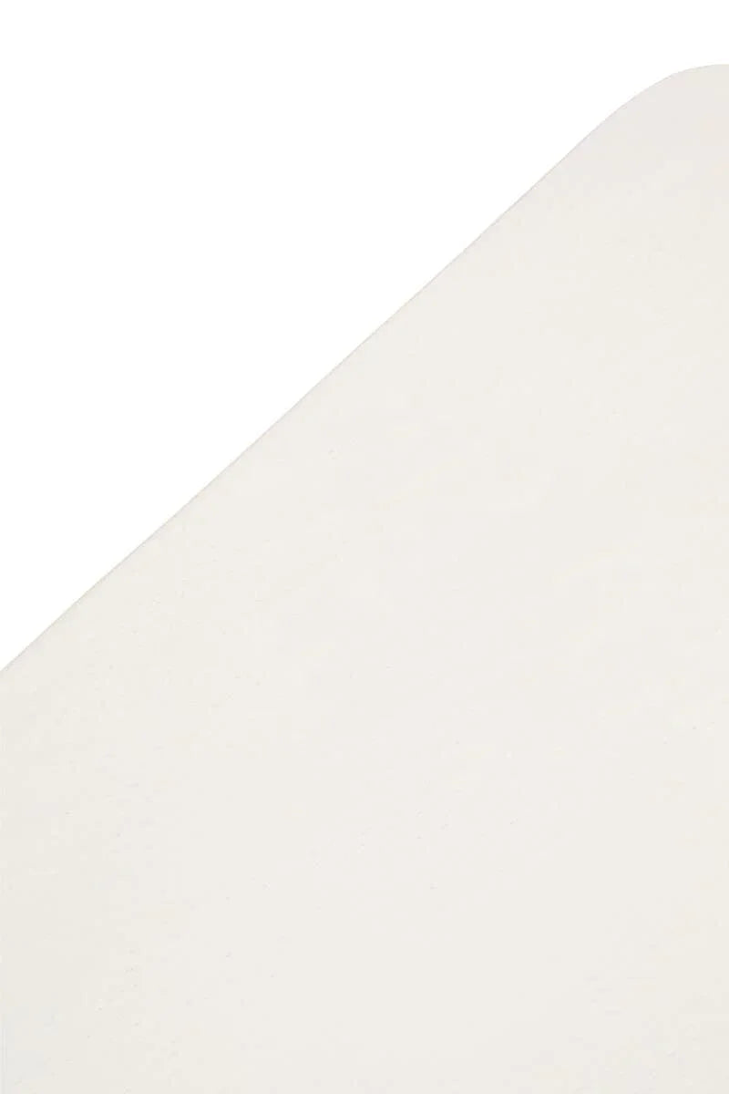 closeup of cream fabric upholstery for sofa or bed corner, showing texture and finish