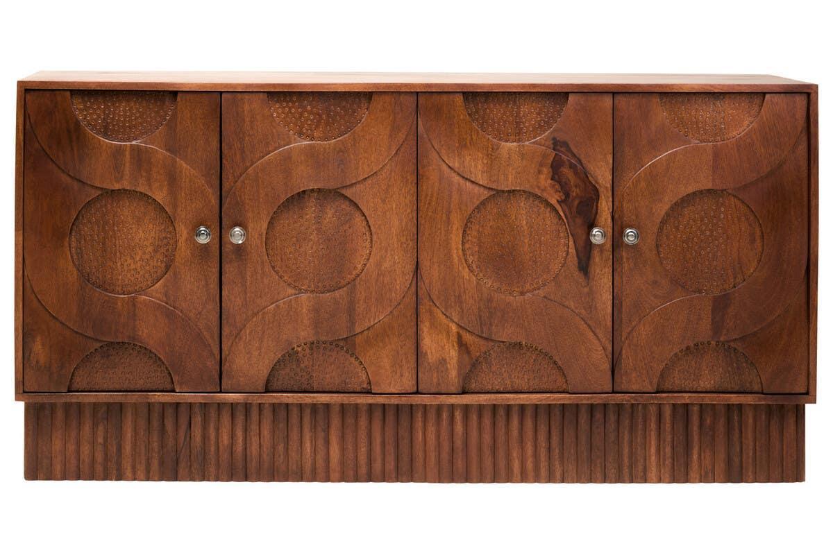 Carved wood sideboard with four doors and circular pattern on the front panel