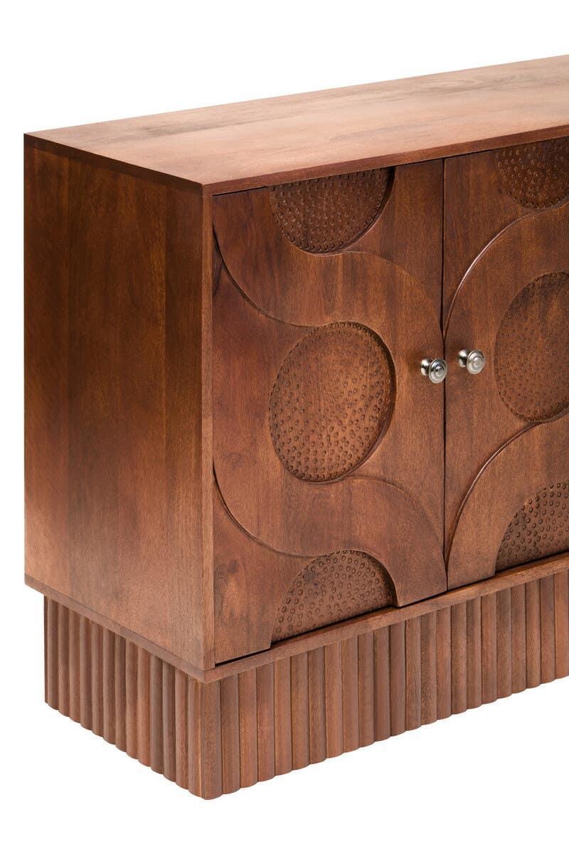 Solid wood sideboard with carved geometric doors and fluted base, close corner angle