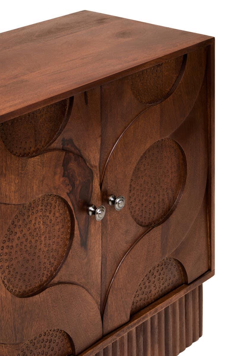 Carved wood sideboard with textured geometric circle design and metal door handles