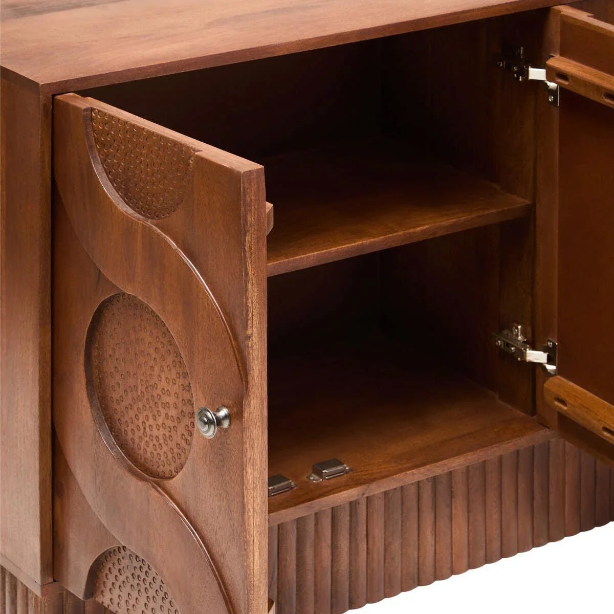 Wooden sideboard cabinet with open doors, inner shelves and carved geometric pattern