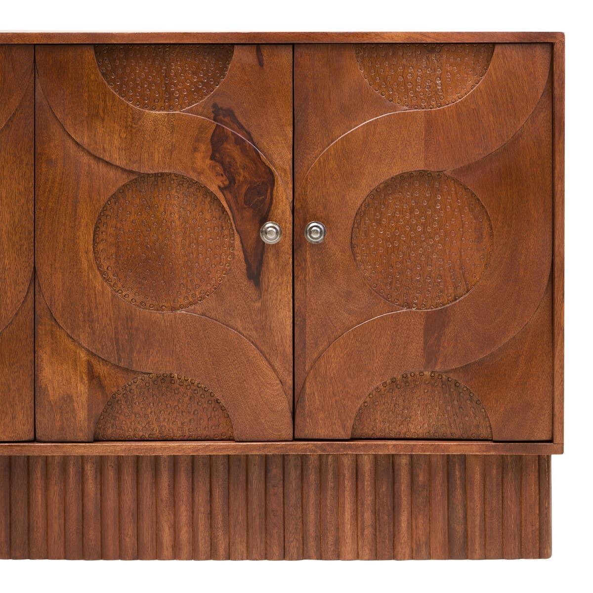 Walnut wood sideboard with carved circular patterns and textured cabinet doors