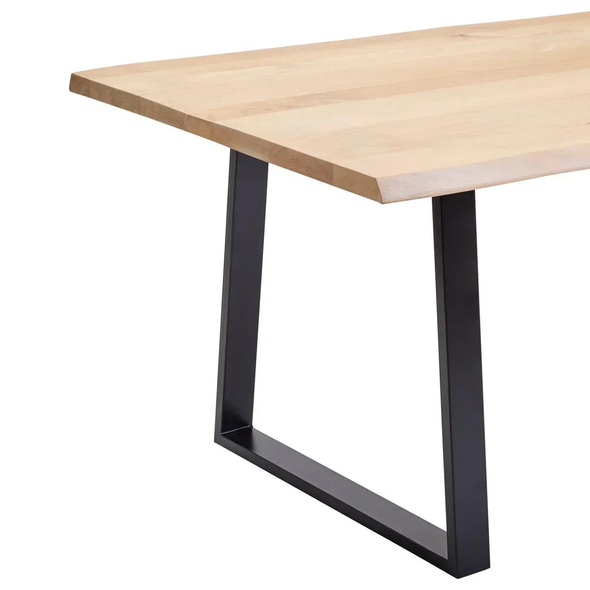 Rectangular wood dining table with black metal legs, close-up on corner and base