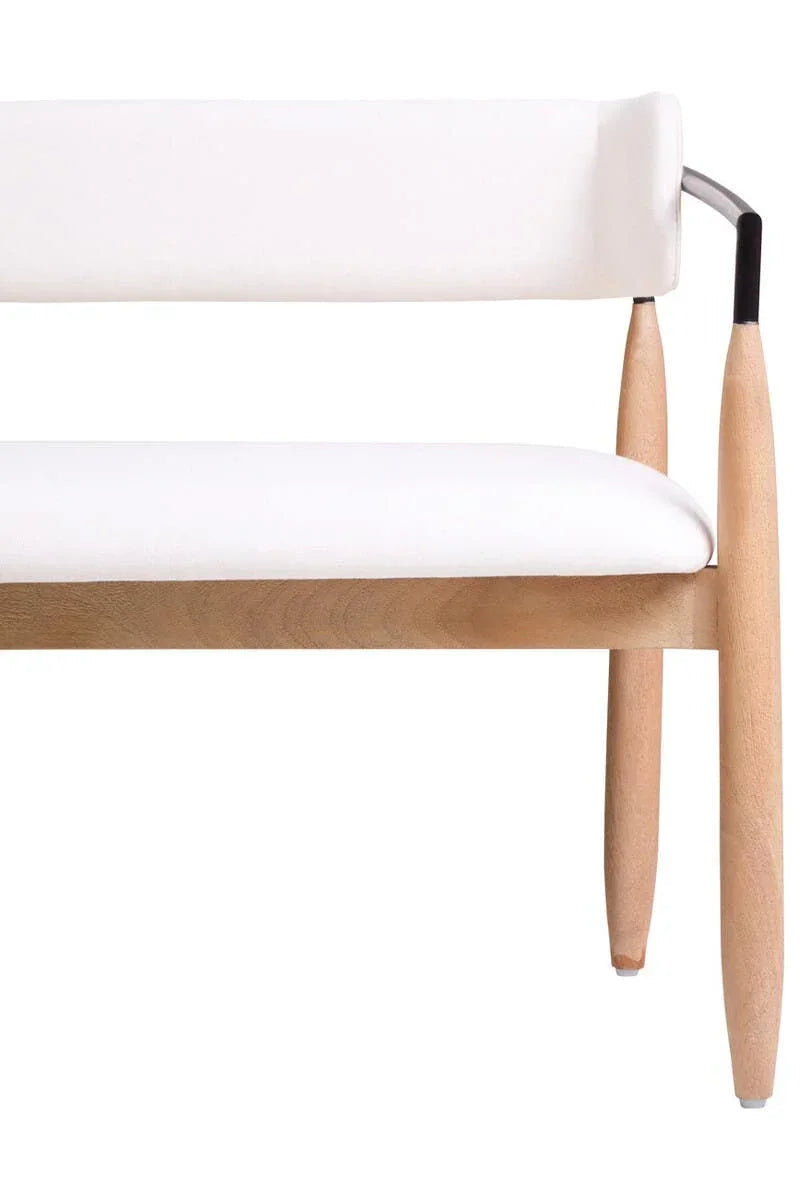 Modern wooden dining chair with white padded seat and backrest, partial side view