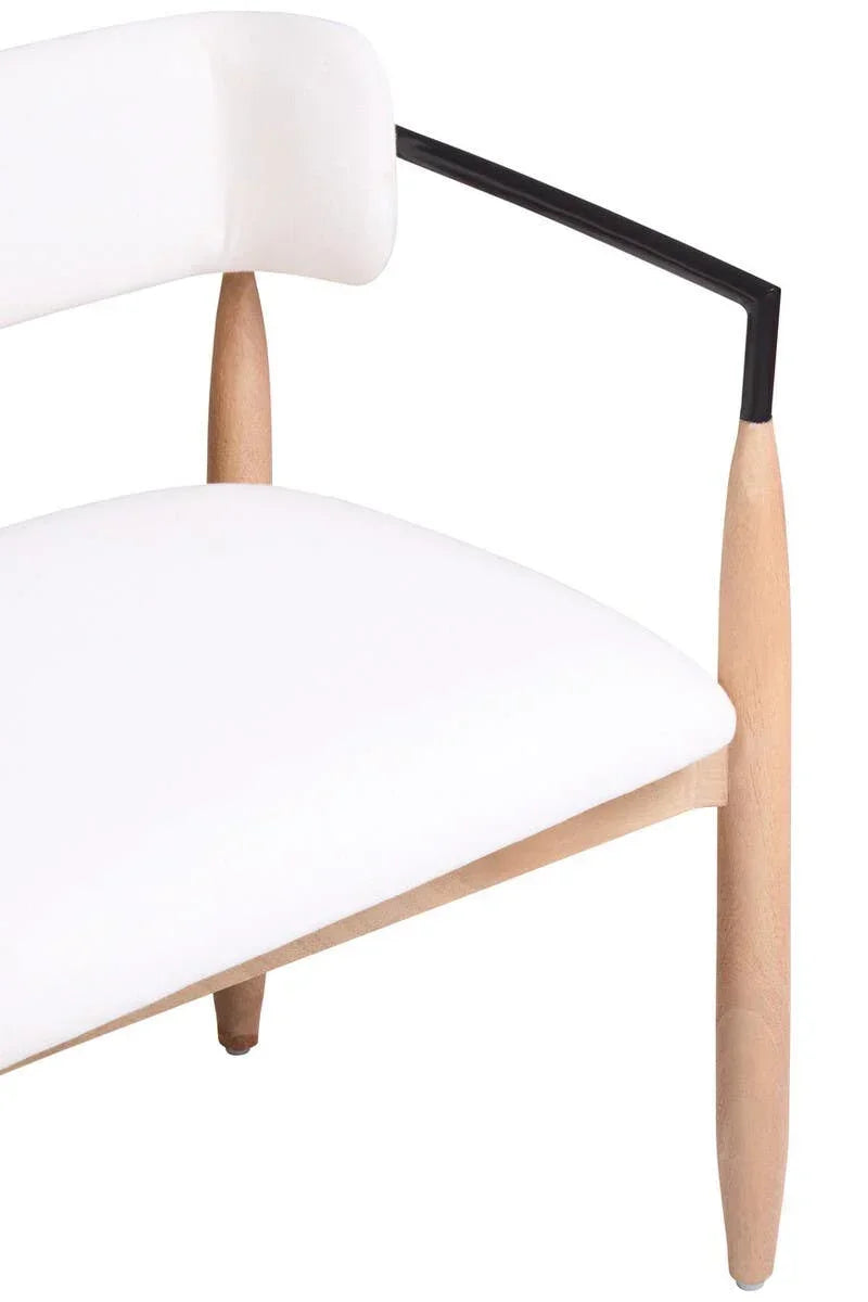 Modern accent chair with white upholstered seat, wooden legs, and black metal armrest detail