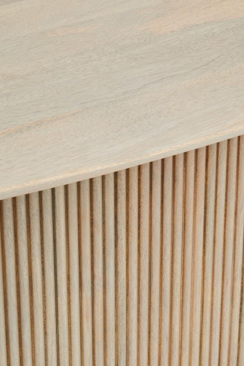 Light wood sideboard with vertical slat detail on front panel and smooth top surface