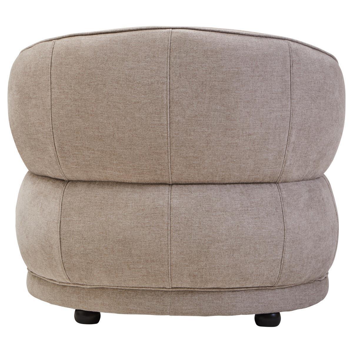 Beige fabric accent chair rear view with rounded padded back and stitched detailing