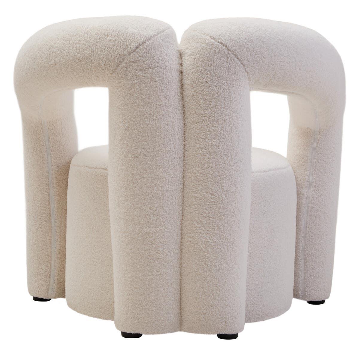 Curved boucle accent chair in cream fabric with open back and modern sculpted shape