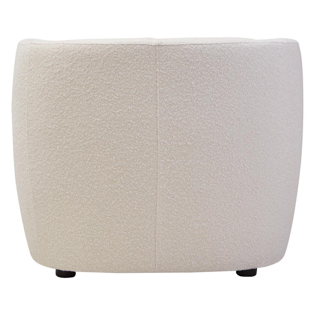 Back view of cream boucle accent chair with subtle stitching and rounded edges