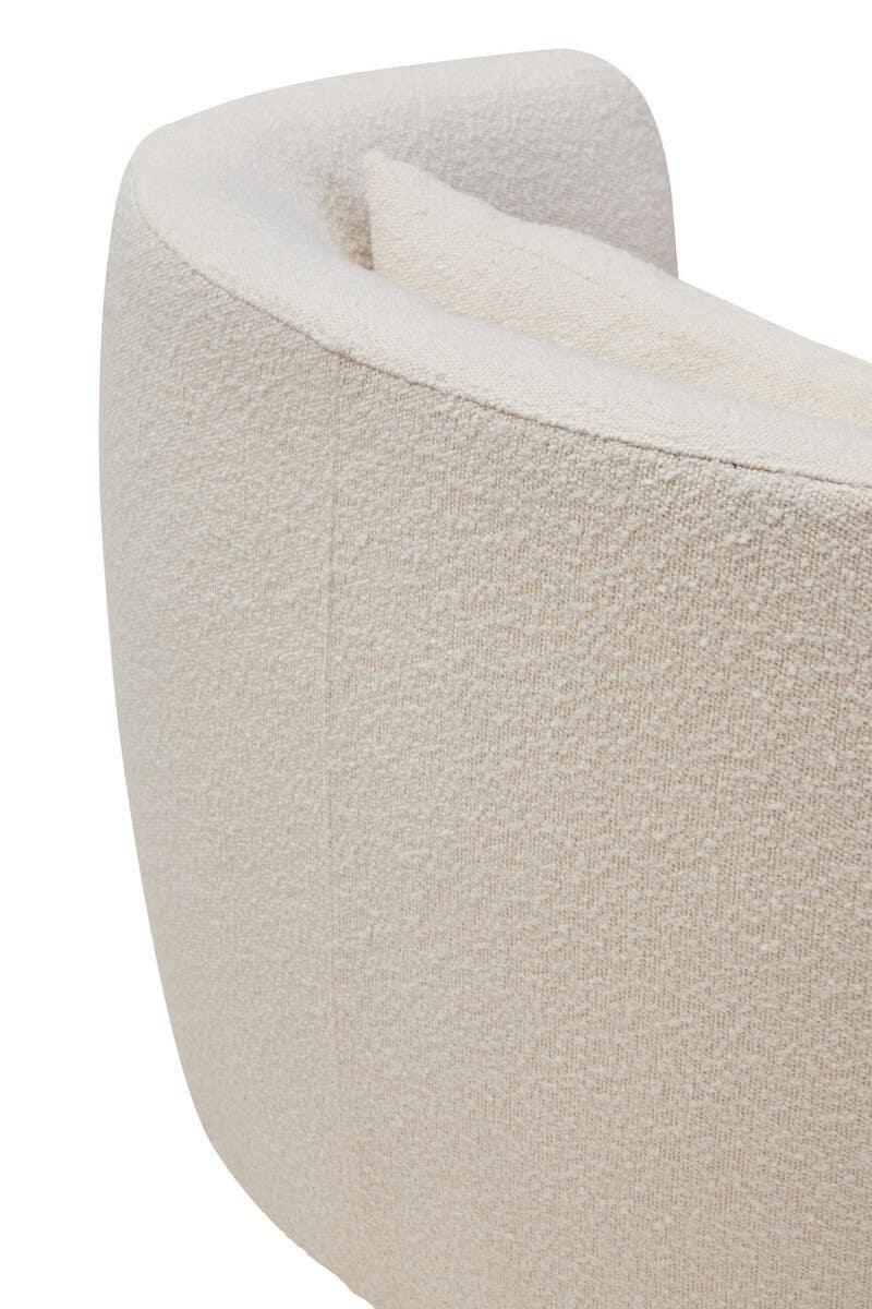 Curved beige fabric armchair with textured upholstery and matching cushion, rear angle view