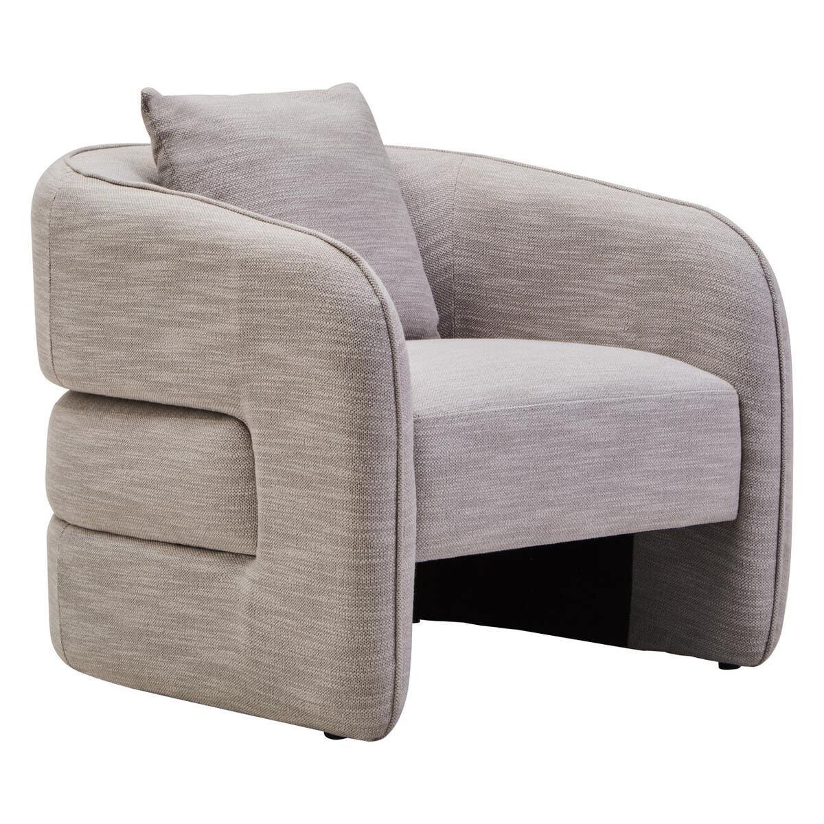 Modern beige fabric armchair with curved armrests and matching cushion